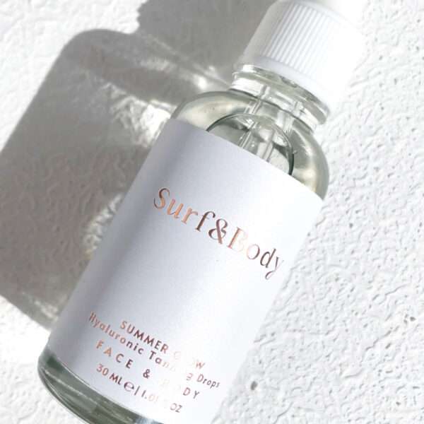 Heels Agency Feature Surf n Body Summer Glow Shimmering Body Oil ed-it.co flaunt.media Founder Demi Karan Tanning Drops